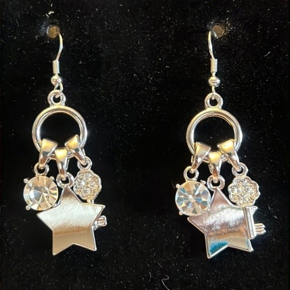 Fun silver tone dangle earrings.